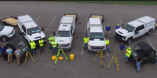 Survey team with project equipment  image